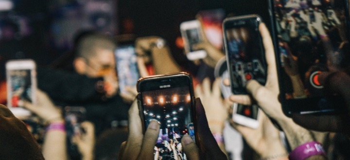 Smartphones being used at a live event