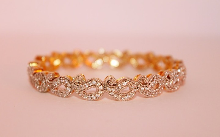 Gold jewelry bracelet with detailed craftsmanship